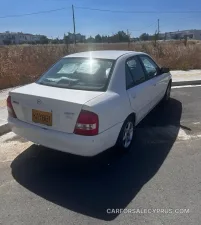 Mazda Familia 1999 – φωτογραφία 9